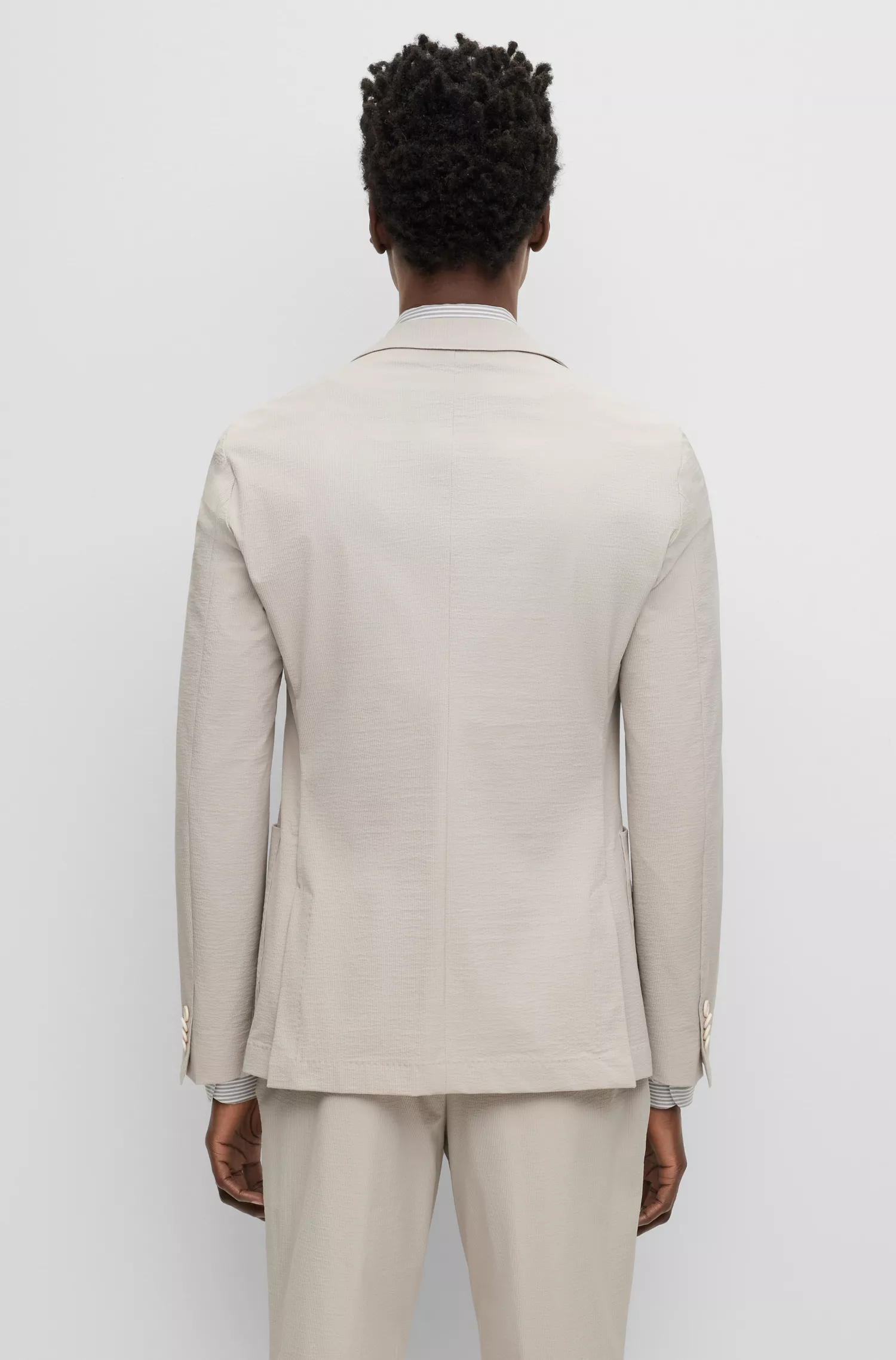 Terno slim fit preto da BOSS em tecido elástico de alta performance com microestampa.