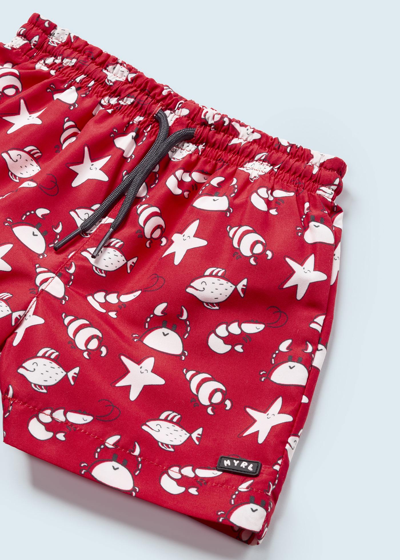 Conjunto de duas peças com camiseta e maiô para bebê
