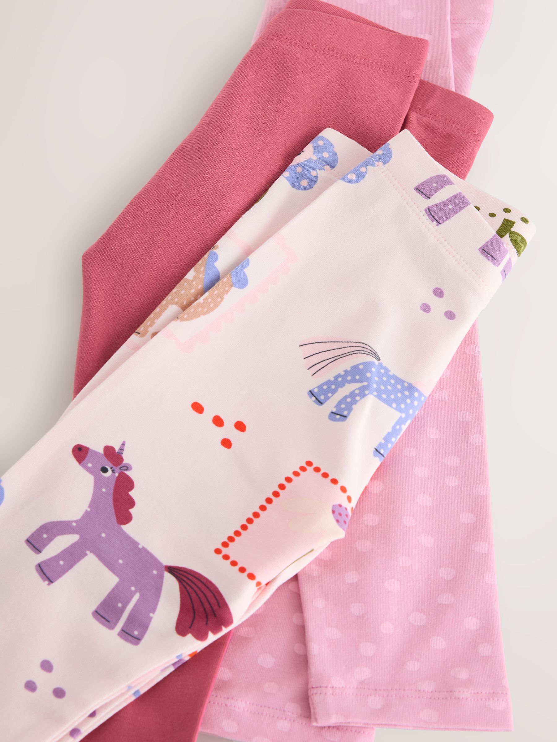Roze met eenhoornprint - Verpakking van 3 leggings (3 mnd-7 jr)