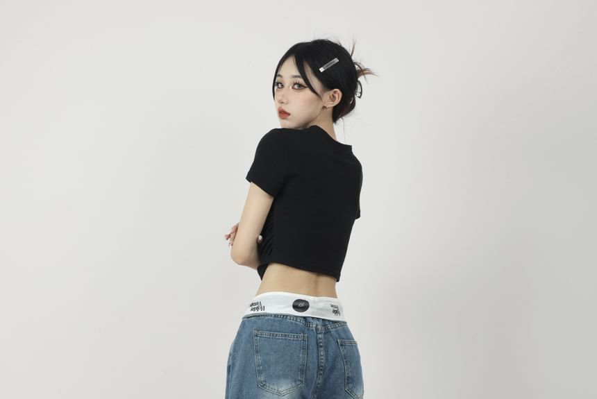 AXEN - Lage taille jeans met letters en wijde pijpen