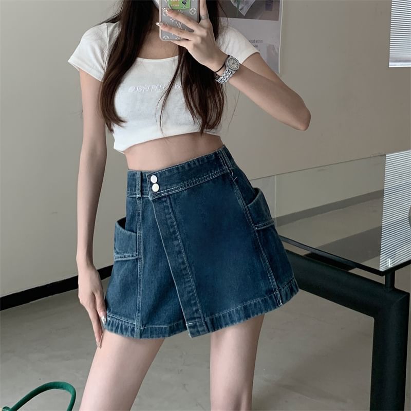 Moon City - Asymmetrische, gewassen denim skort met hoge taille