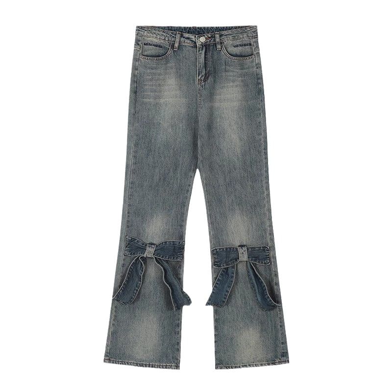 Jerolenea - Bootcut jeans met lage taille en strikaccent