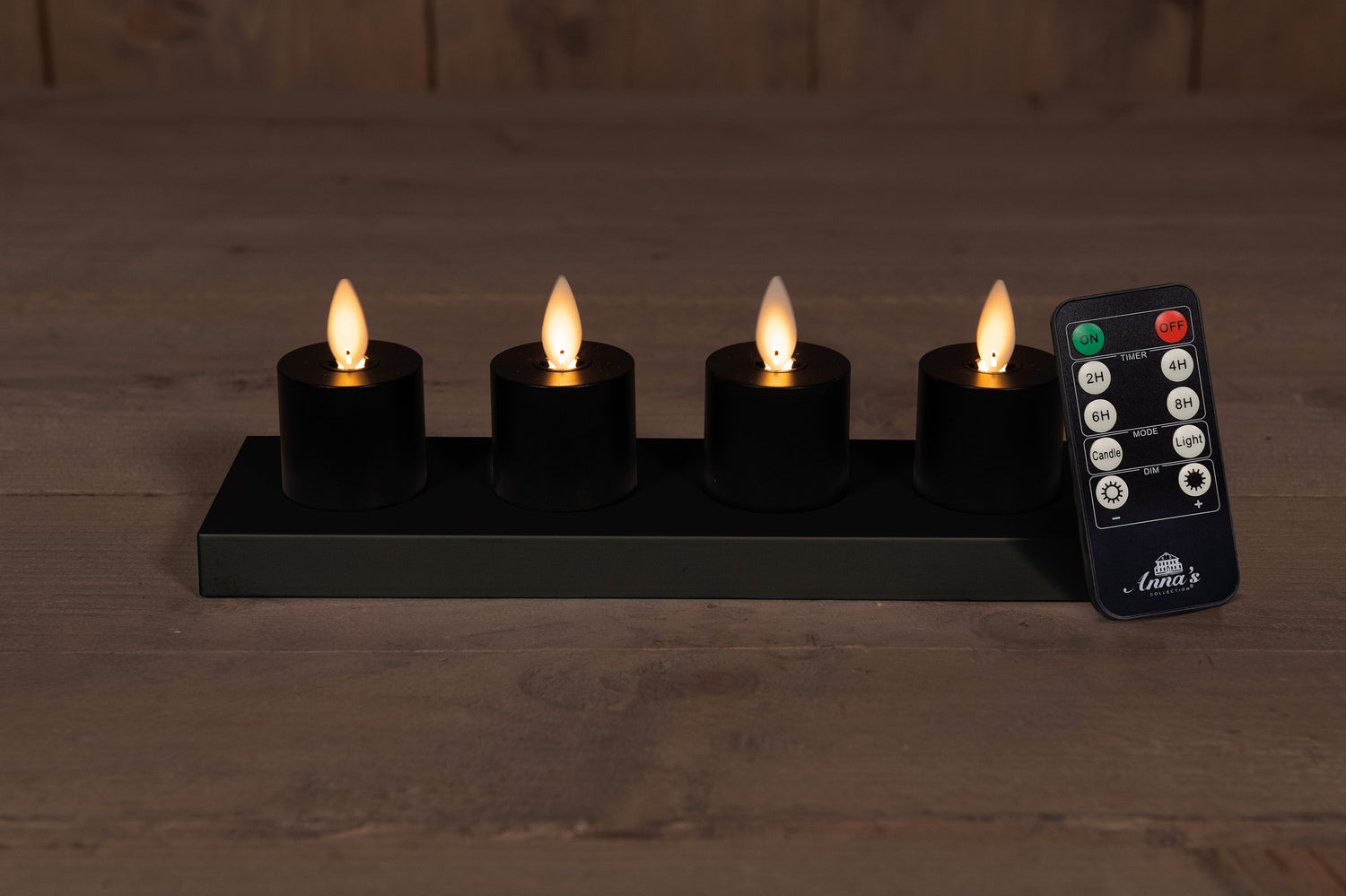Anna's Collection LED startset waxinelicht met oplaadstation zwart D 3,8 H 6 cm 4 stuks