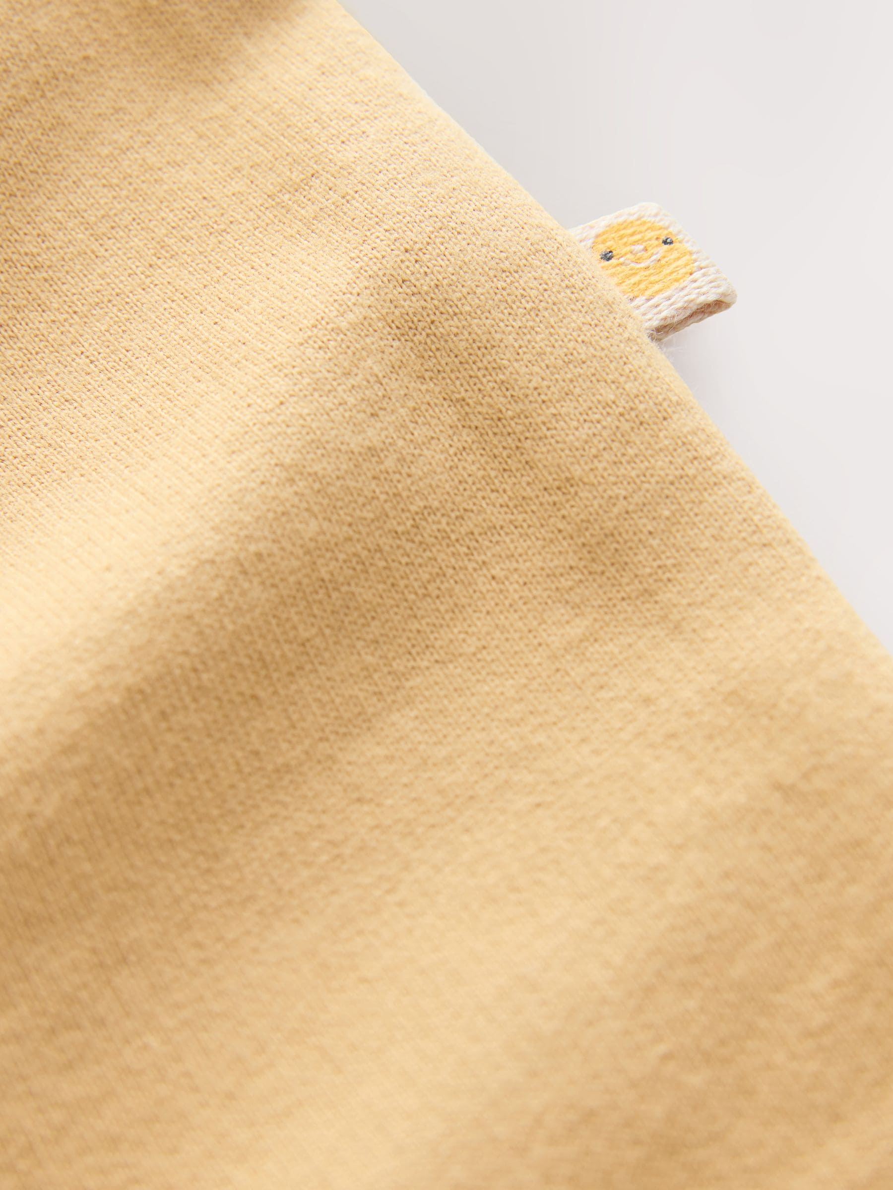 Met verschillende kleurvlakken - Baby joggingromper (0mnd-3jr)