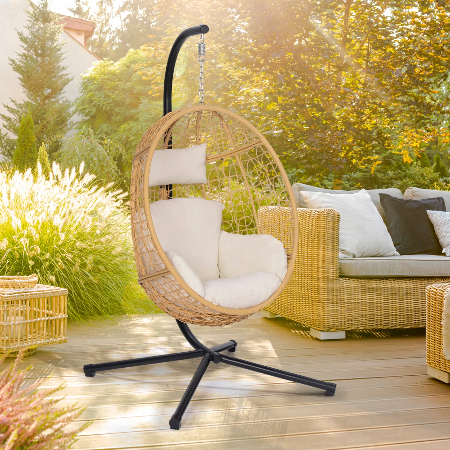 Fauteuil oeuf suspendu ajouré effet rotin avec coussin écru