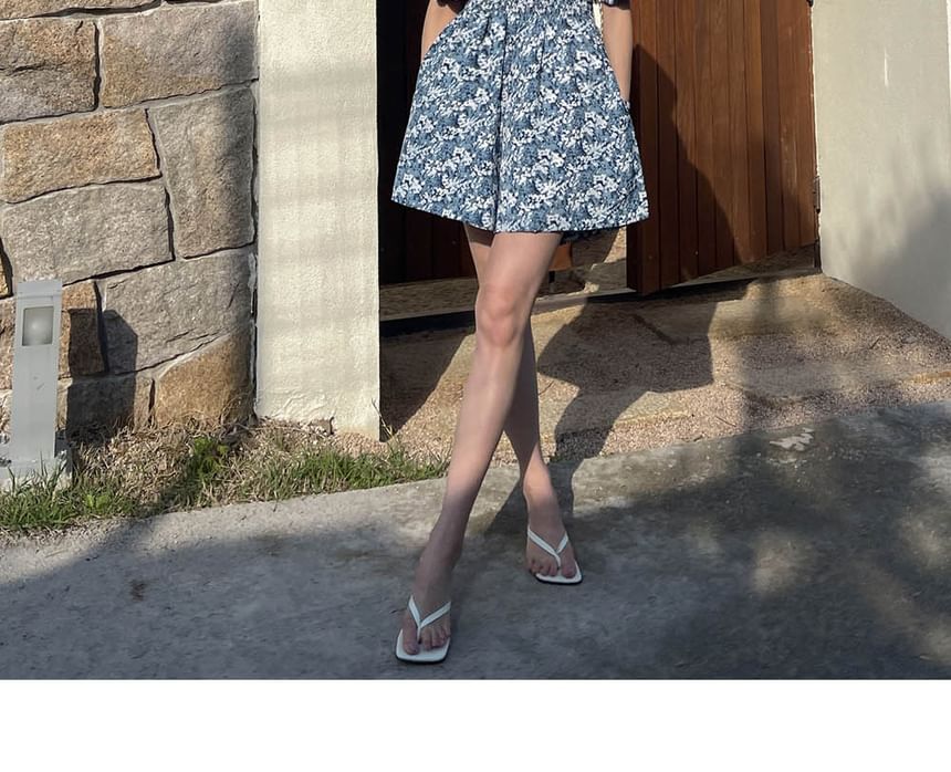 Coris - Romper met korte mouwen, off-shoulder bloemenprint en wijde pijpen