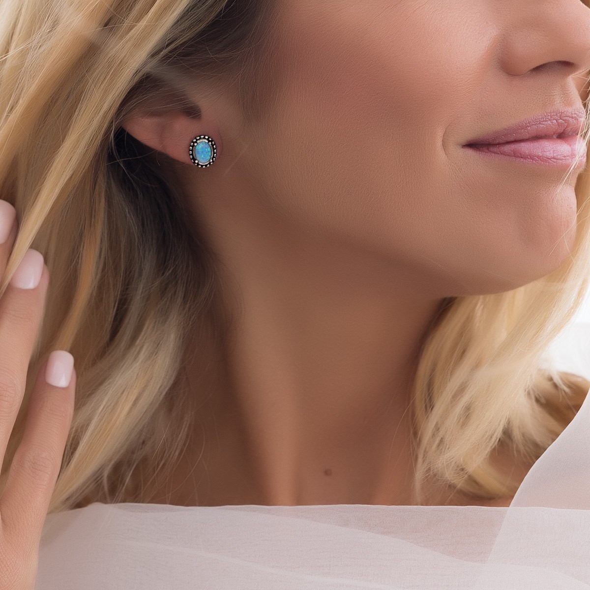 Boucles d'oreille argent rhodié opale bleue d'imitation forme ovale