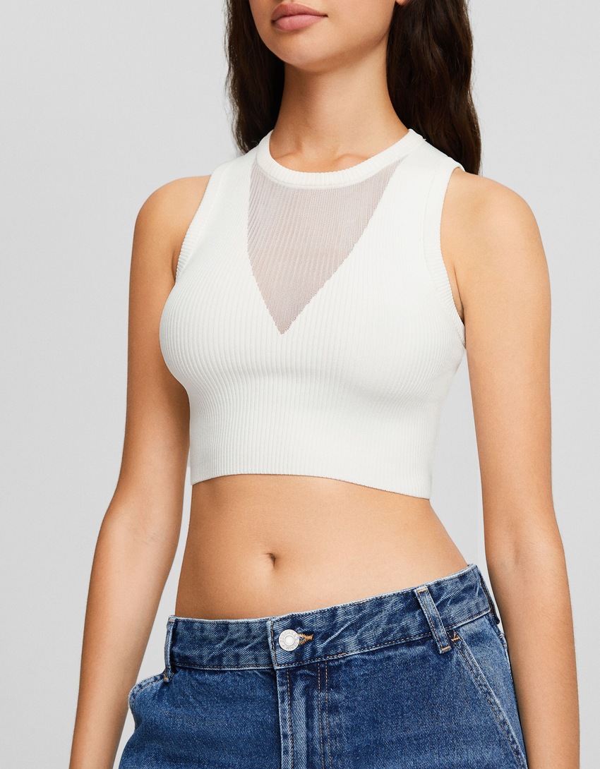 Blusa transparente sem mangas com decote em V