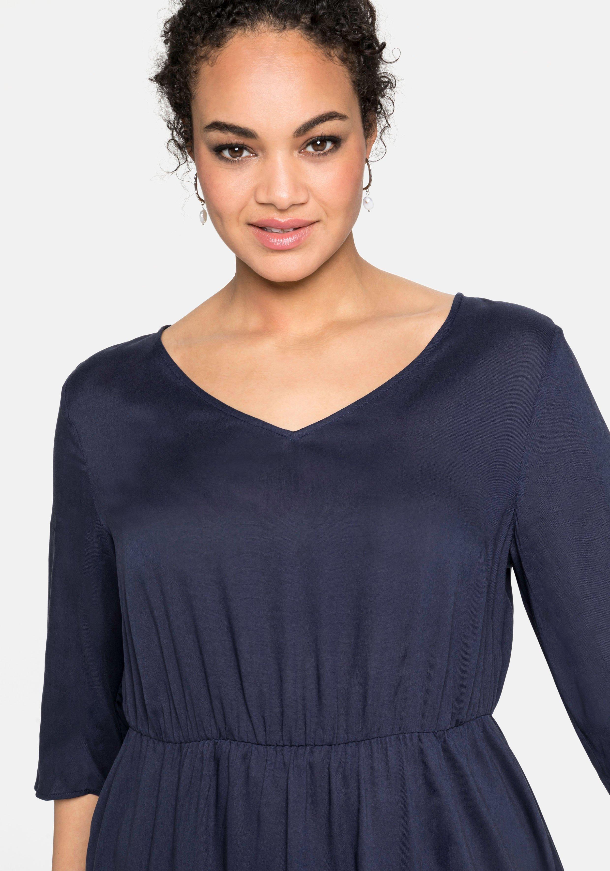 Kleid mit 3/4-Ärmel und Volant am Saum