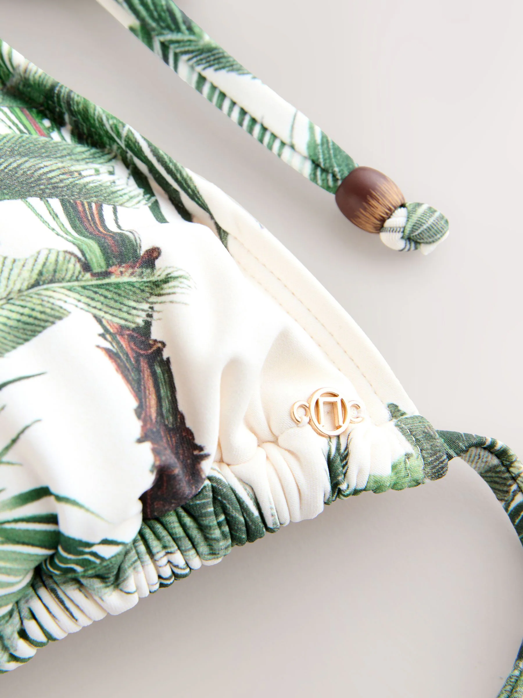 Crèmekleurig met palmboomprint - Driehoekige bikinitop