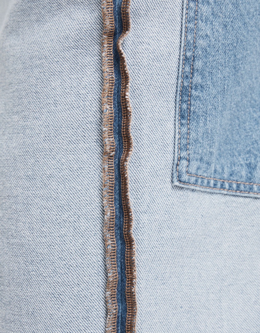 calças jeans largas ao contrário