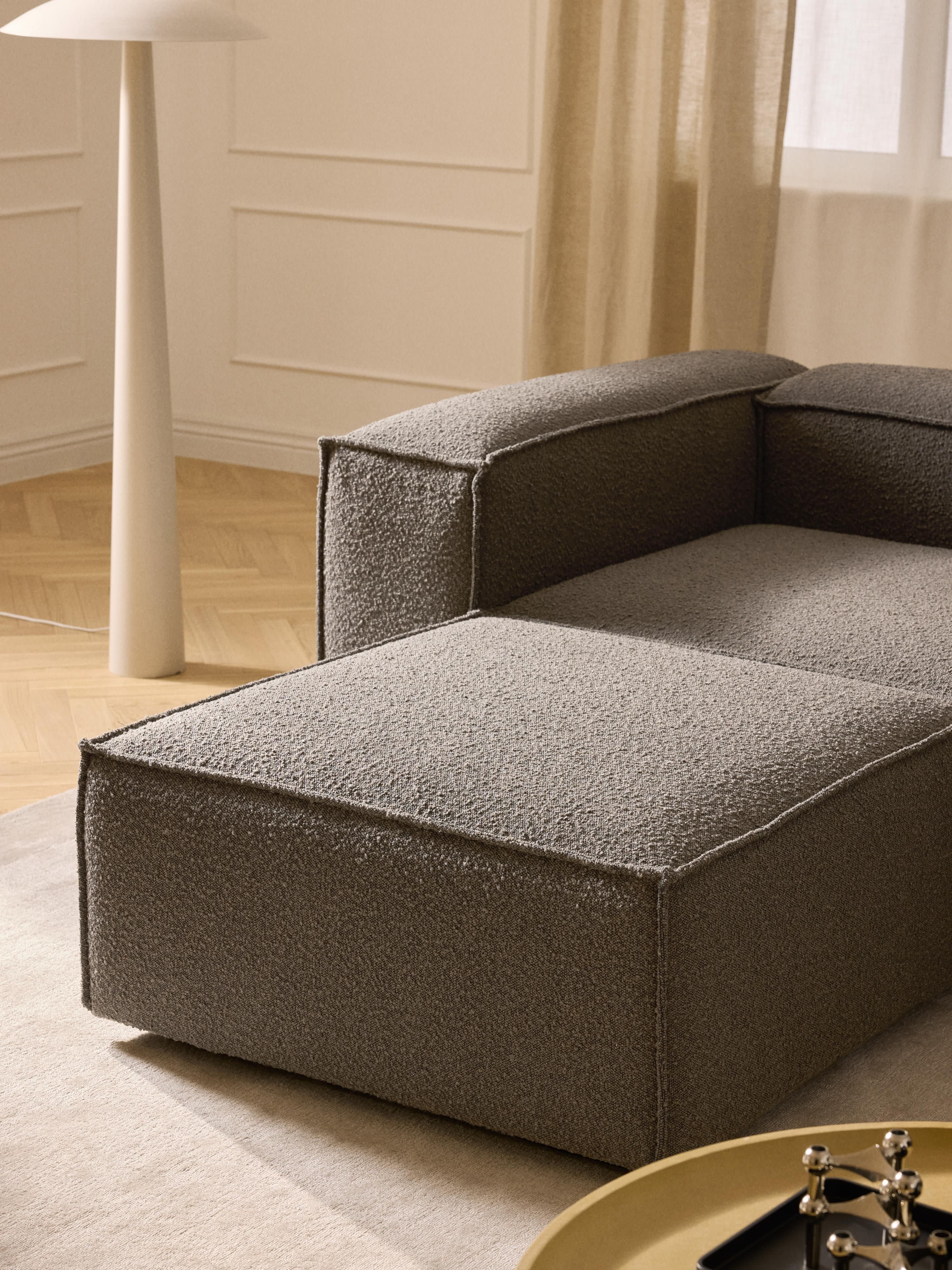 Lennon modulaire bank (4-zits) in bouclé met poef (links/rechts)