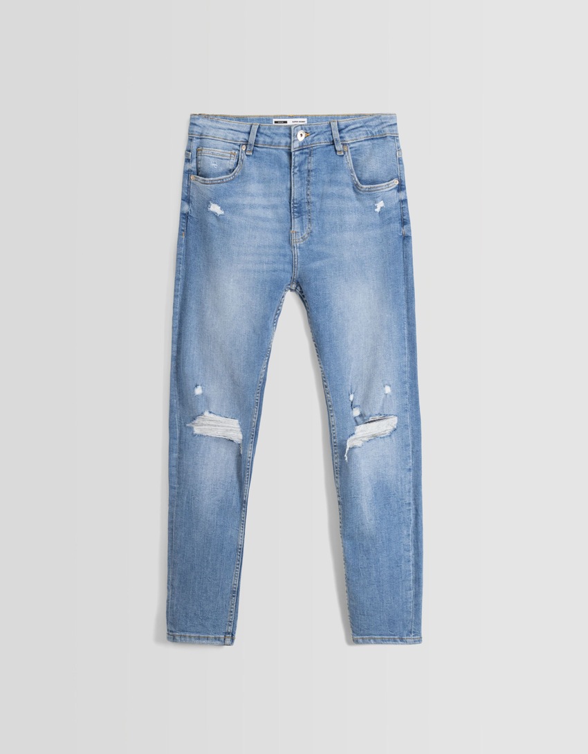 Calça jeans skinny rasgada