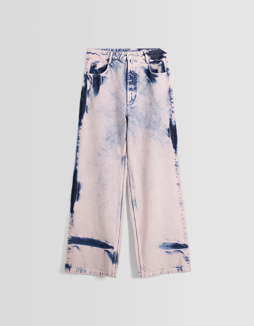 jeans super largos tingidos em excesso
