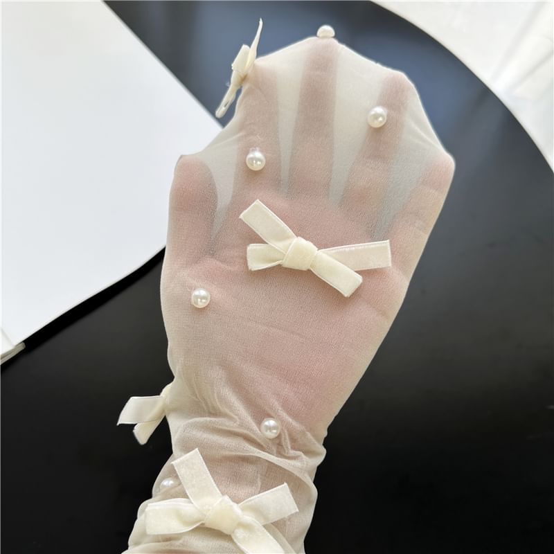 Gentiana - Panty met strik en imitatieparels