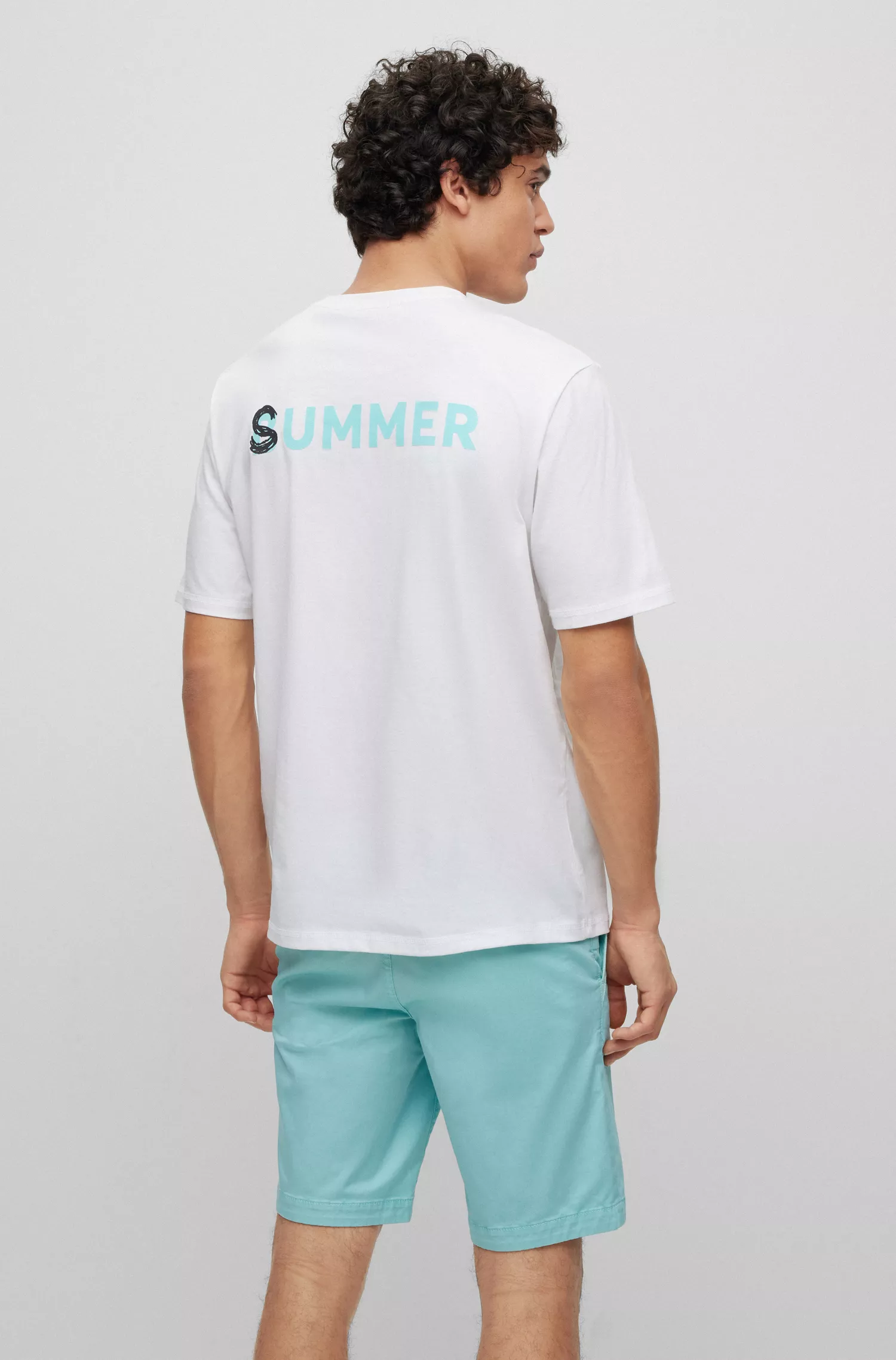 Camiseta BOSS laranja, modelagem relaxada, em algodão, com estampa na frente e nas costas.