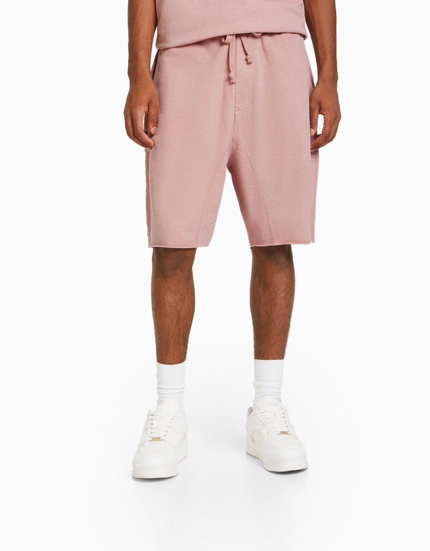 Bermudas de pelúcia com efeito desbotado