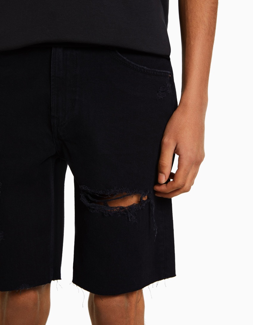 Bermuda jeans rasgada de corte justo