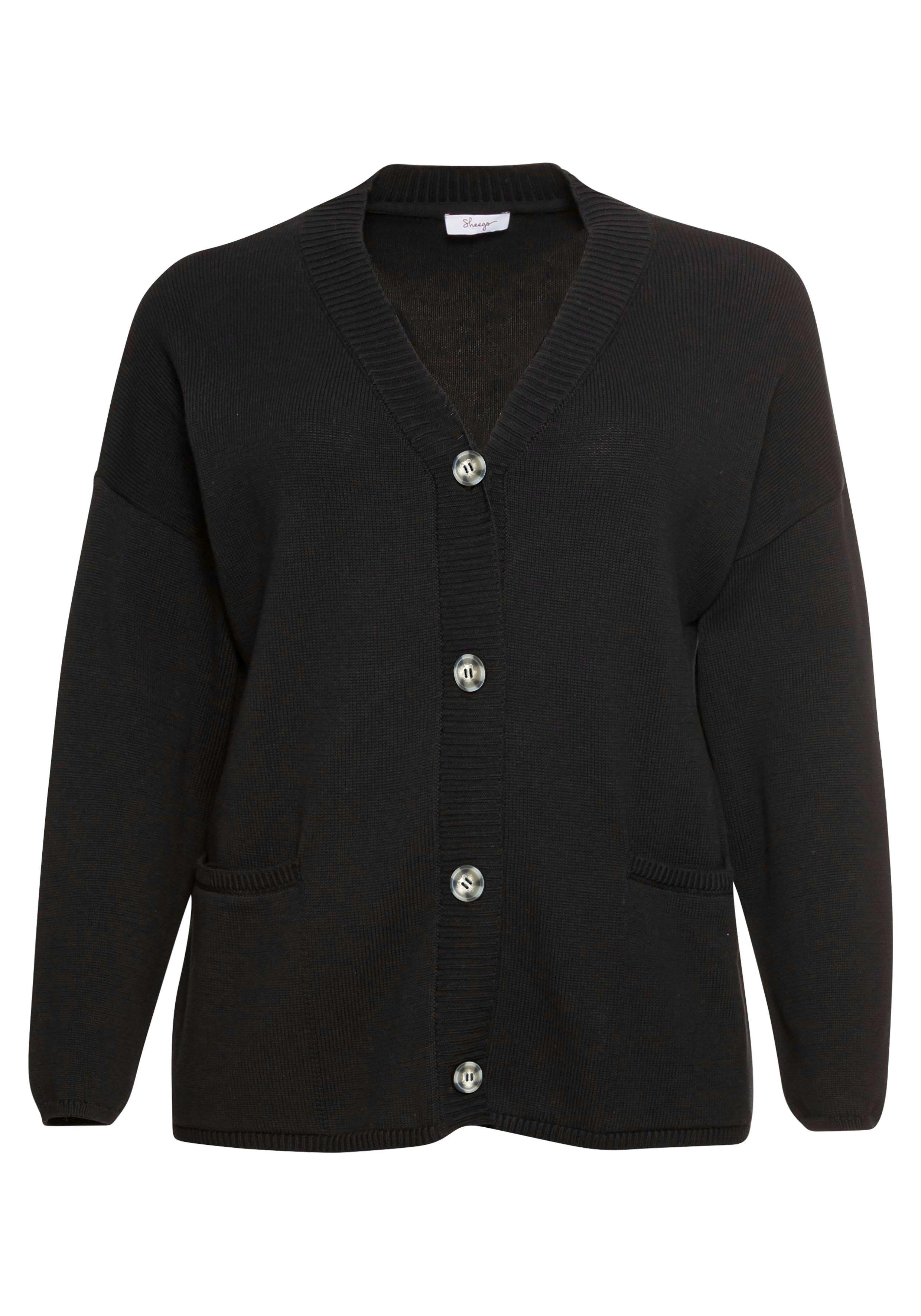 Strickjacke in Kurzform mit großen Taschen