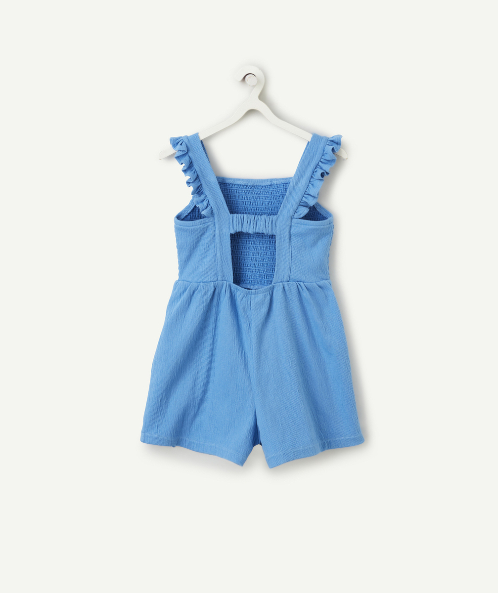 combi-short fille bleue avec ouverture dos et bretelles à volants