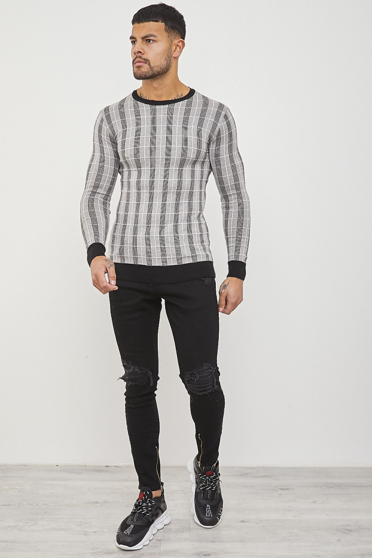 Pull gris imprimé à carreaux