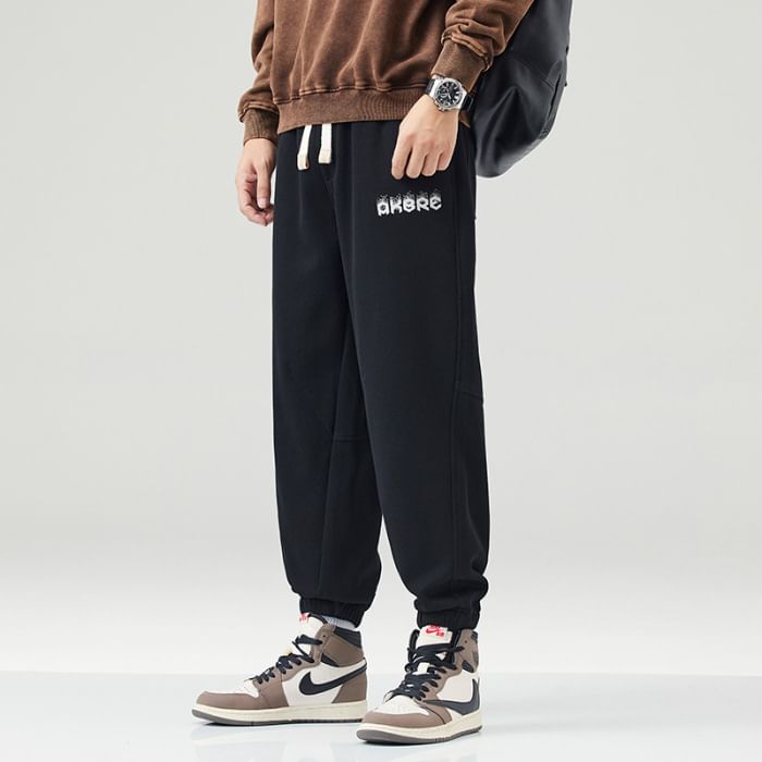 Nataro - Joggingbroek met rechte pijpen en middelhoge taille en tekst
