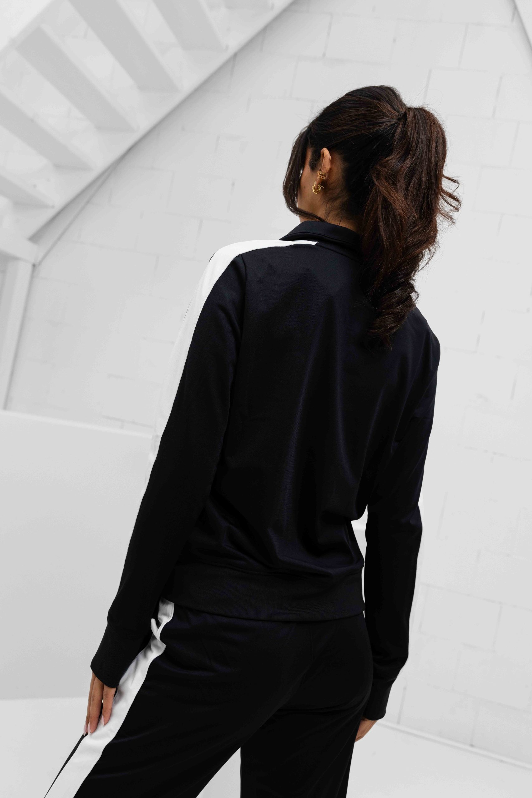 Under Armour Tricot Trainingspak Dames Zwart