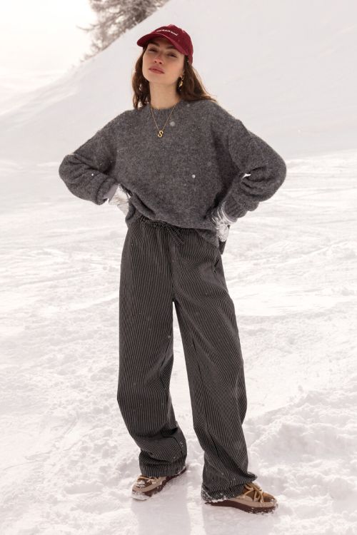 Zwart-wit gestreepte wide leg broek met elastieken band