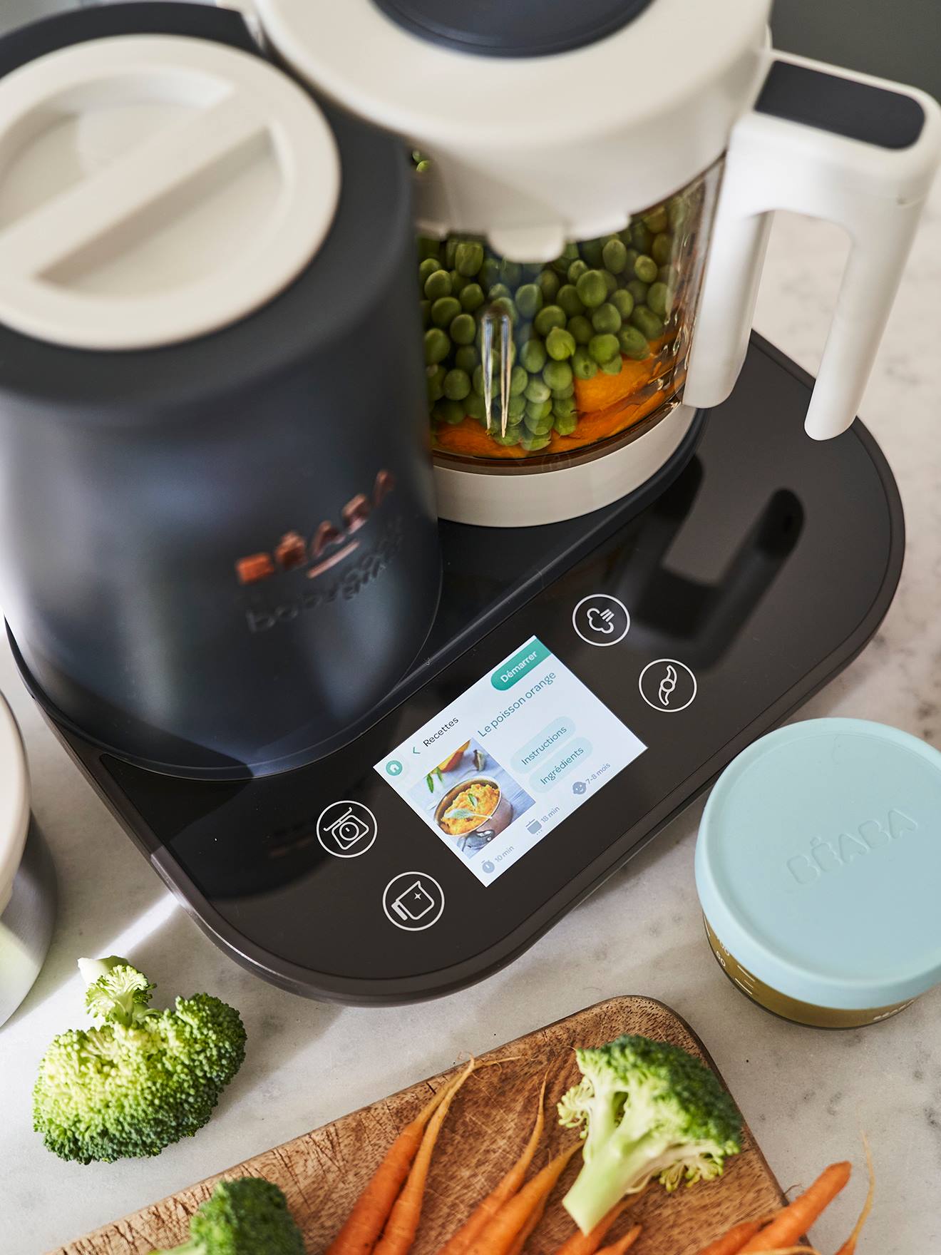 Processador de alimentos online BEABA Babycook Smart, cinza claro liso com padrões.