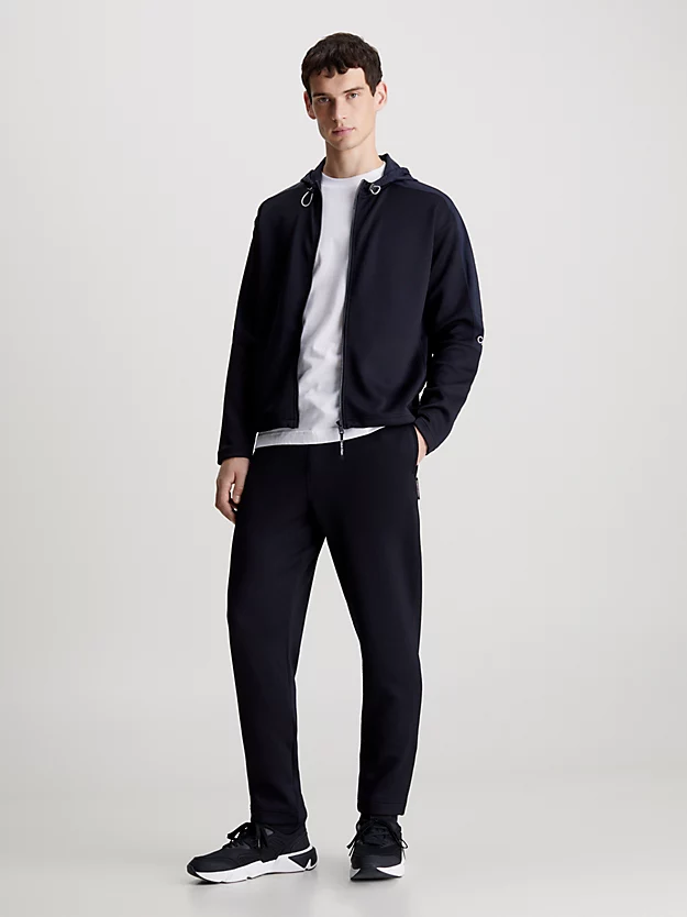 Calça jogger jacquard com cós duplo.
