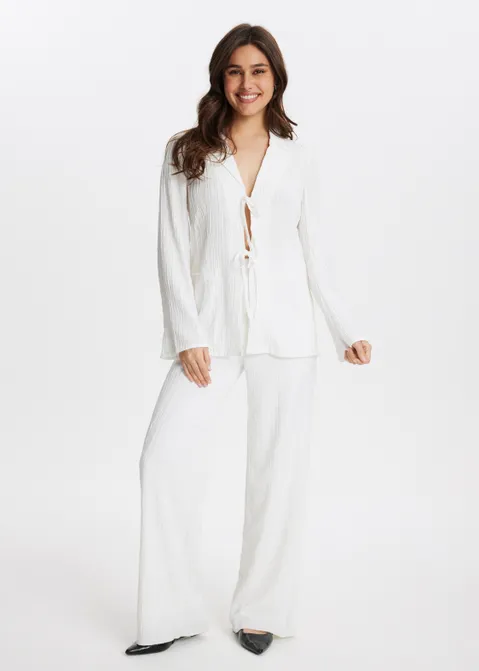 Blouse met structuur en strikjes off-white (WIT.O)