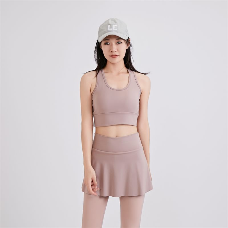 KUMI - Set: Sportieve effen bh-top + yogabroek met hoge taille en rokoverlay