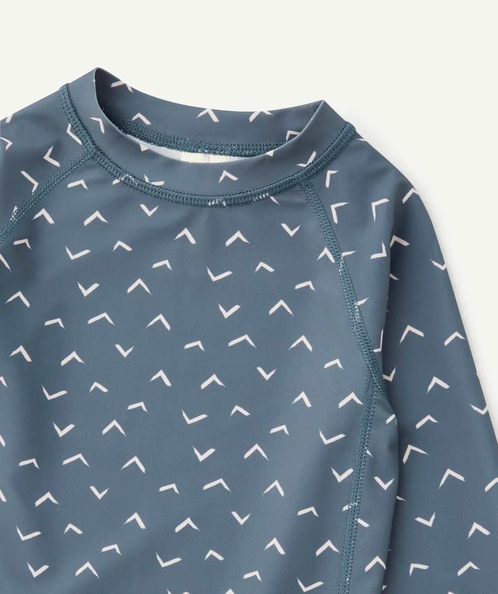 LASSIGT-SHIRT ANTI-UV BÉBÉ BLEU IMPRIMÉ BLANC