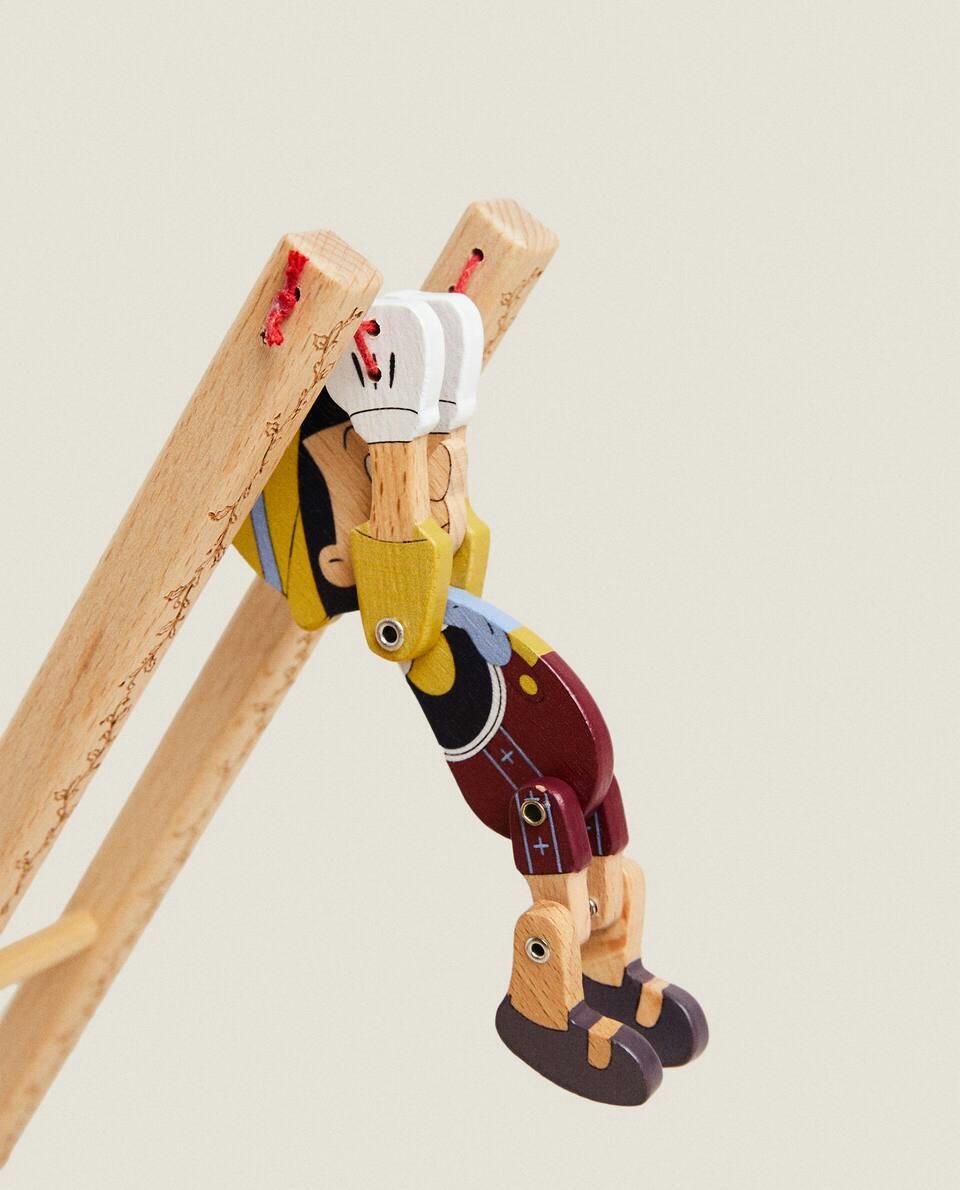 Brinquedo infantil de Natal Pinóquio Trapézio Artístico
