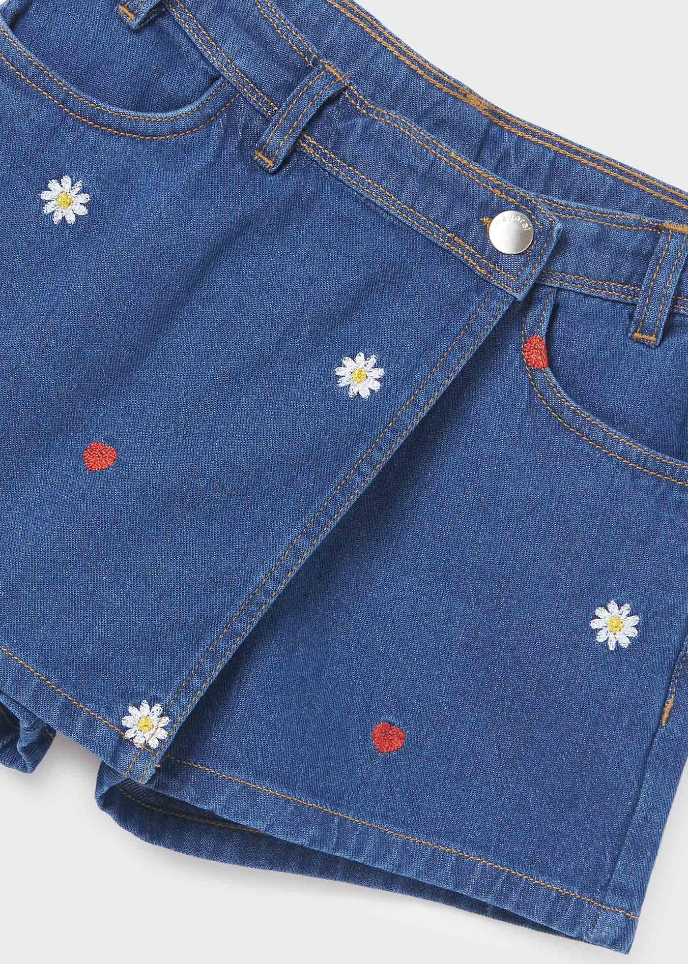 Calças culote de algodão sustentável com bordados em denim para meninas