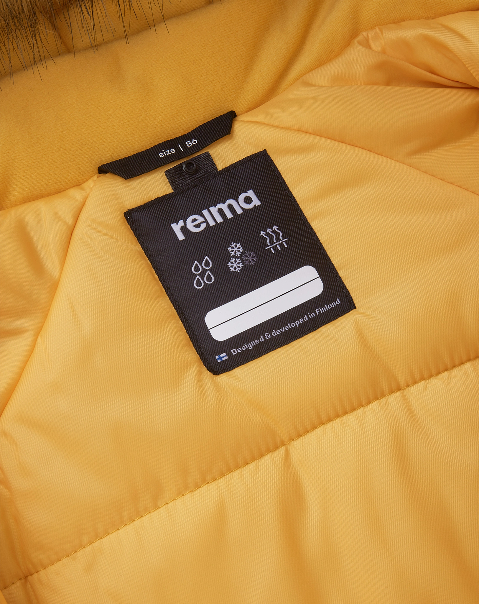Reimatec® Schneeanzug LAPPI in amber yellow