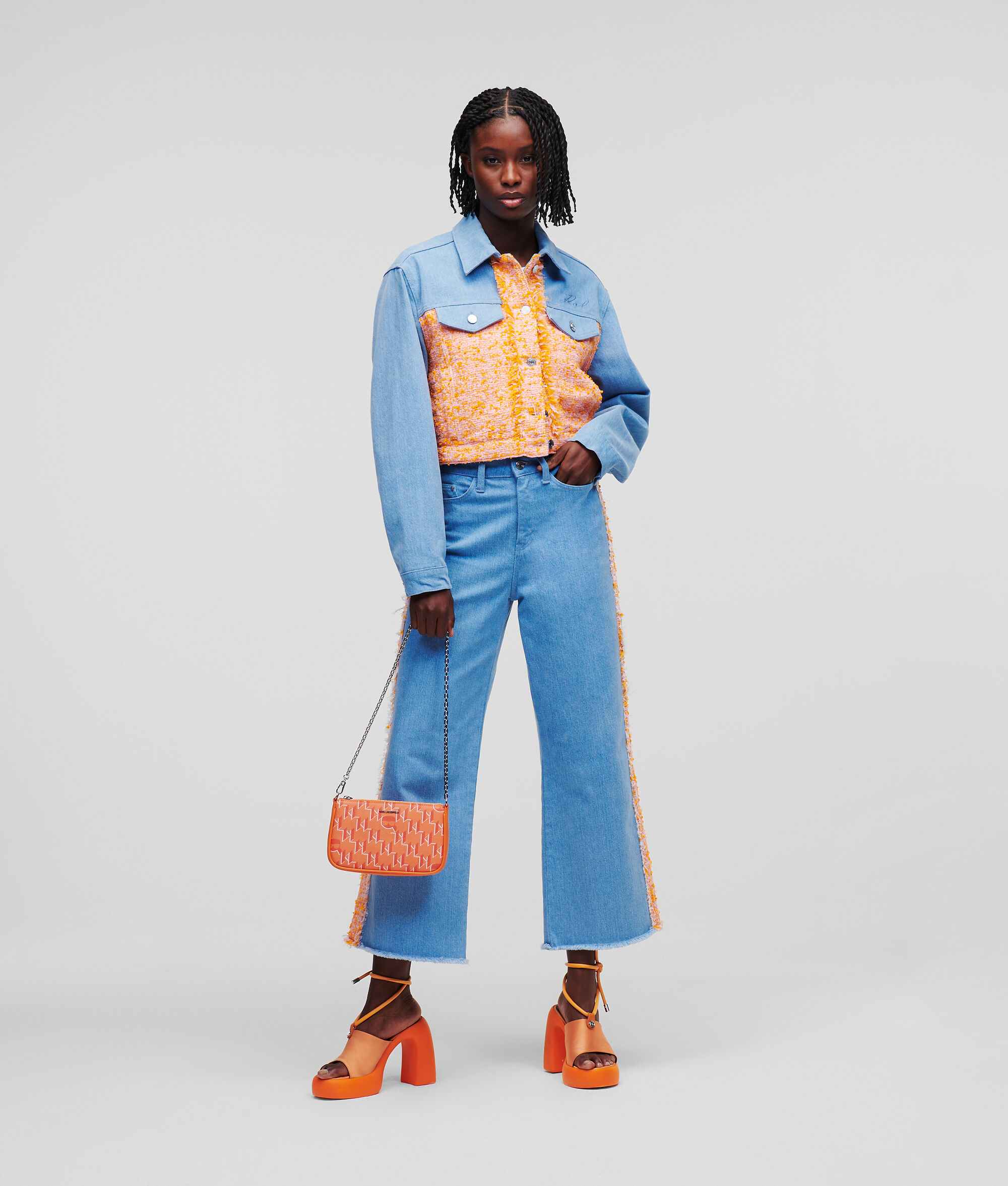 VESTE EN JEAN ET EN TISSU BOUCLÉ