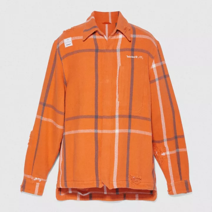 Sobretudo Timberland x A-Cold-Wall unissex na cor laranja.