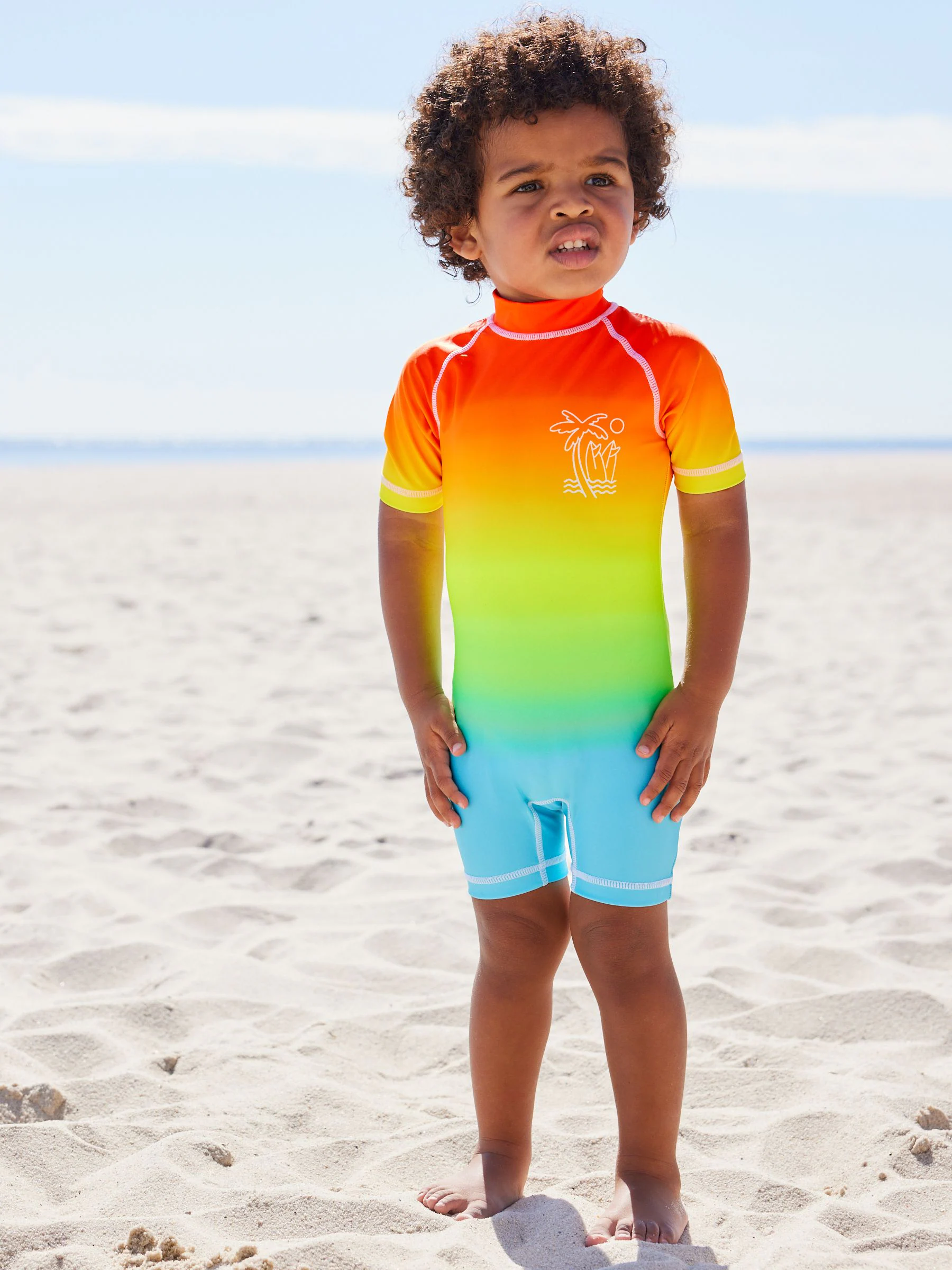 Regenboog dip-dye - Zonbeschermend onesie (3 mnd-7 jr)