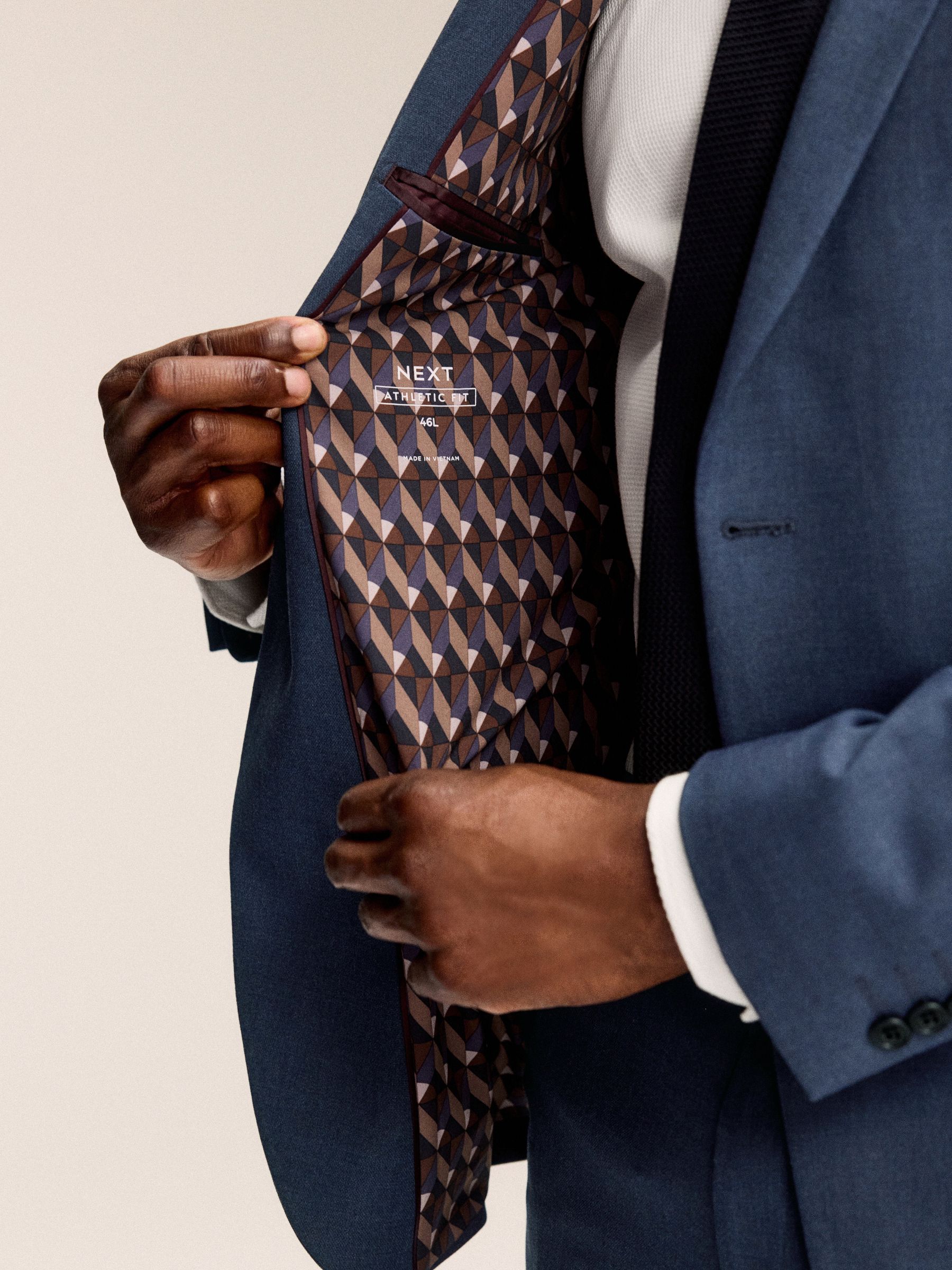 Blauw - Muscle fit meegevend stretchkostuumjasje