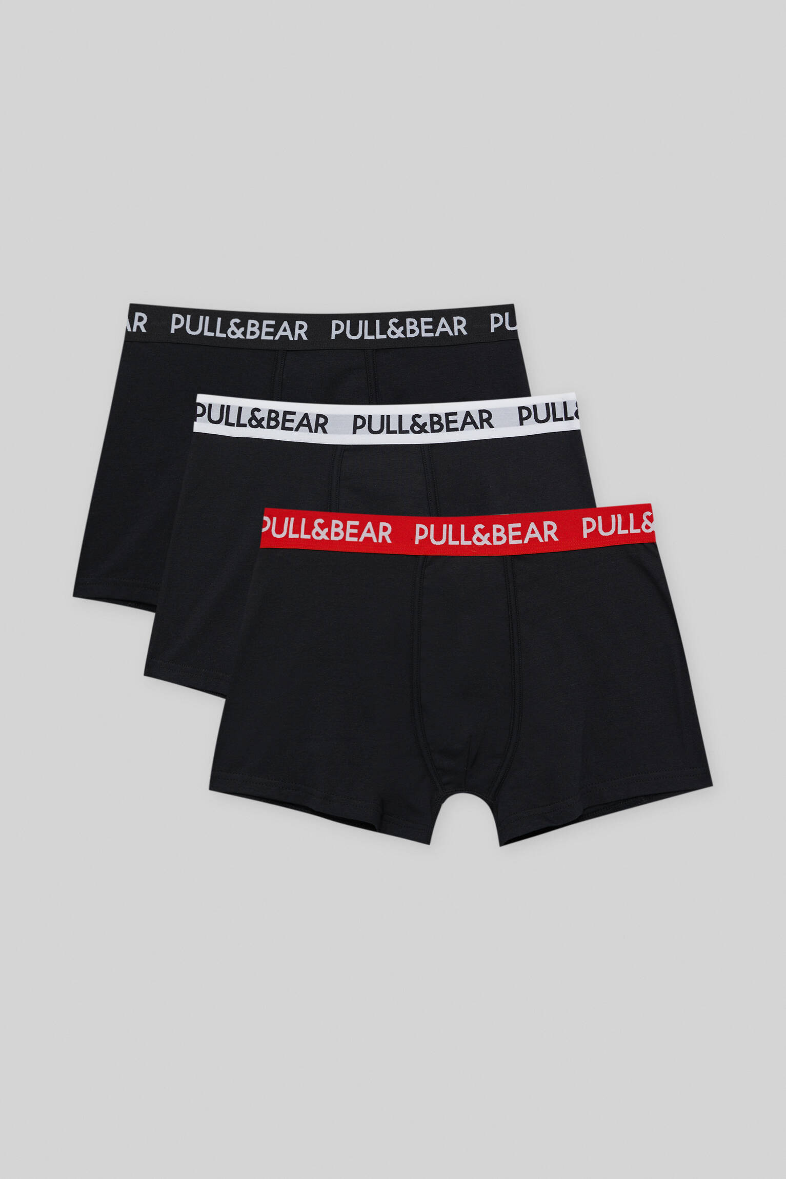 Conjunto de 3 cuecas boxer com cós vermelho - Variadas