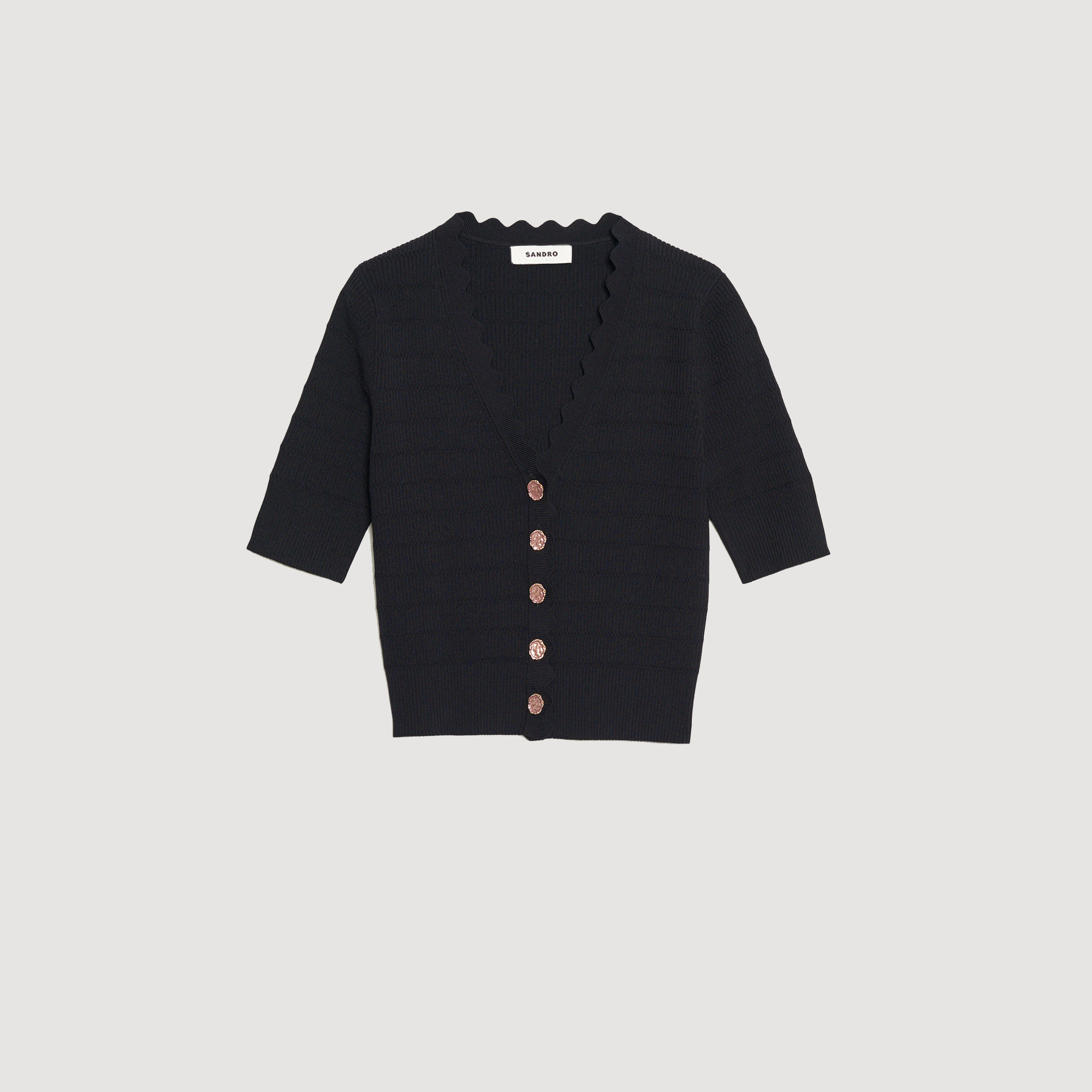 Pull en maille et boutons fantaisie