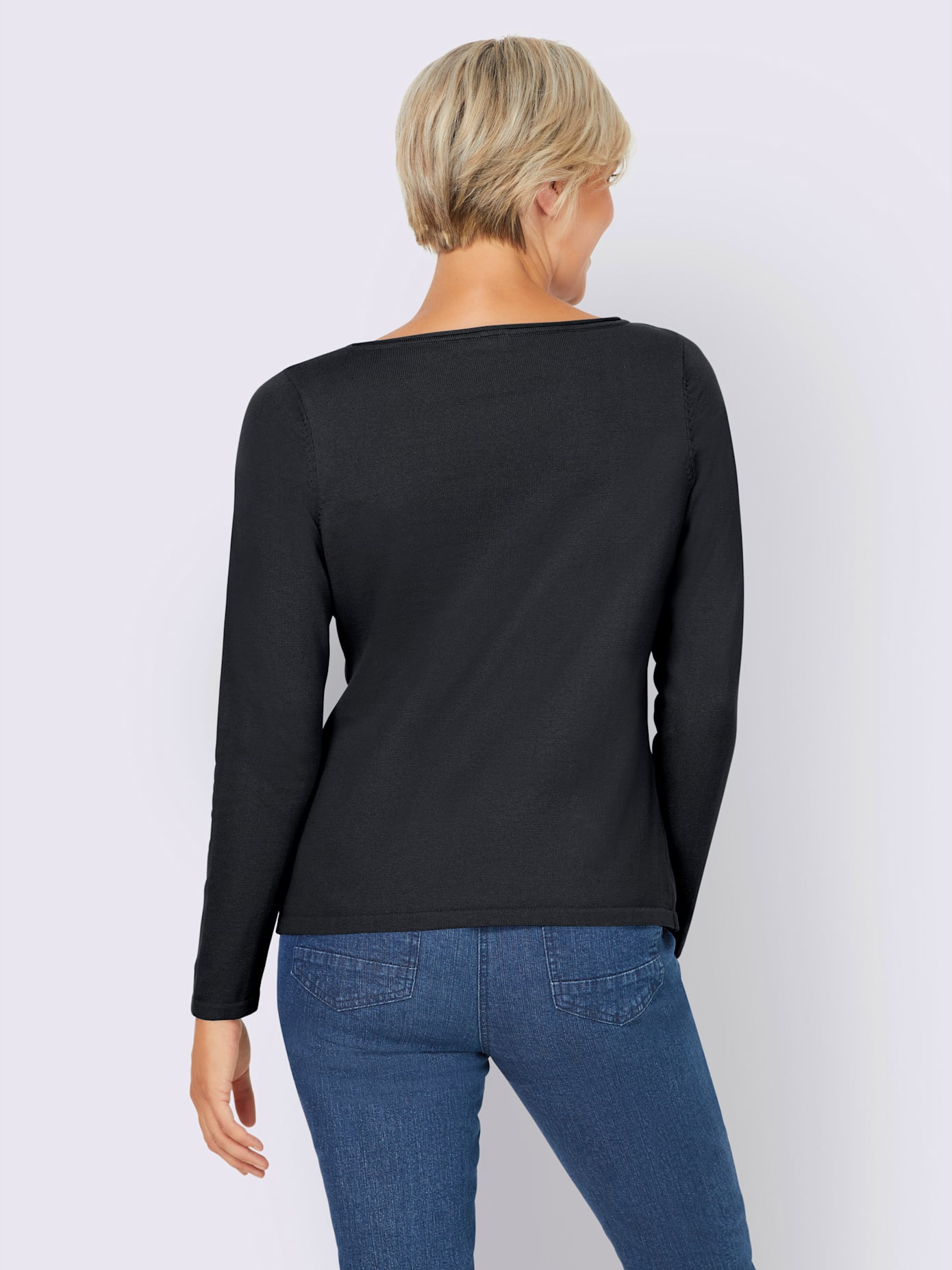 Pull bords roulés aux finitions