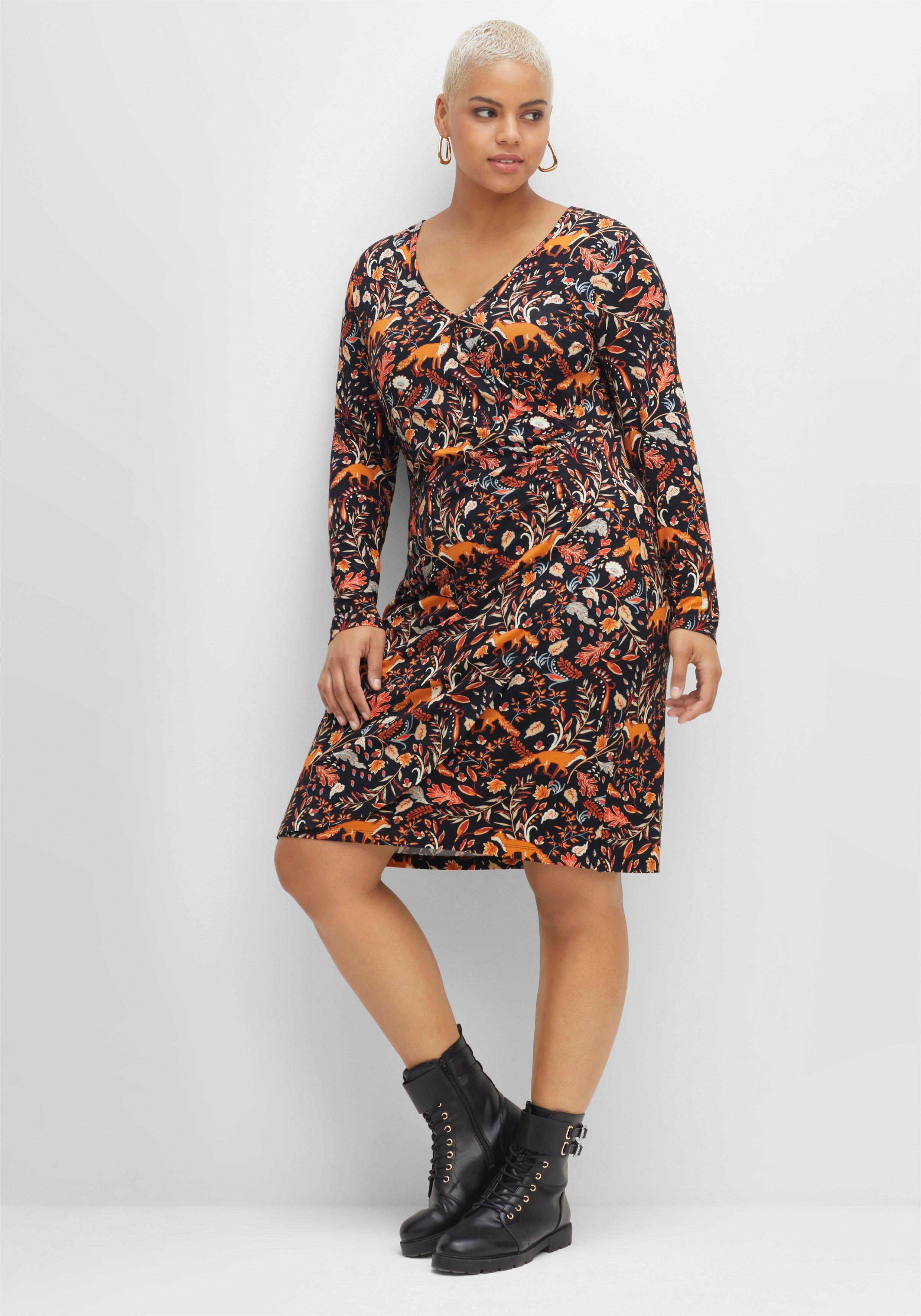 Jerseykleid in Wickeloptik mit tiefem V-Ausschnitt