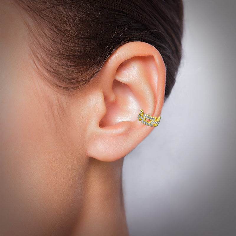 Bague d'oreille dorée avec strass