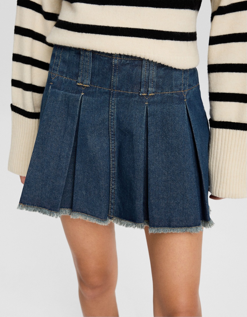 saias-calça plissadas em denim desbotado