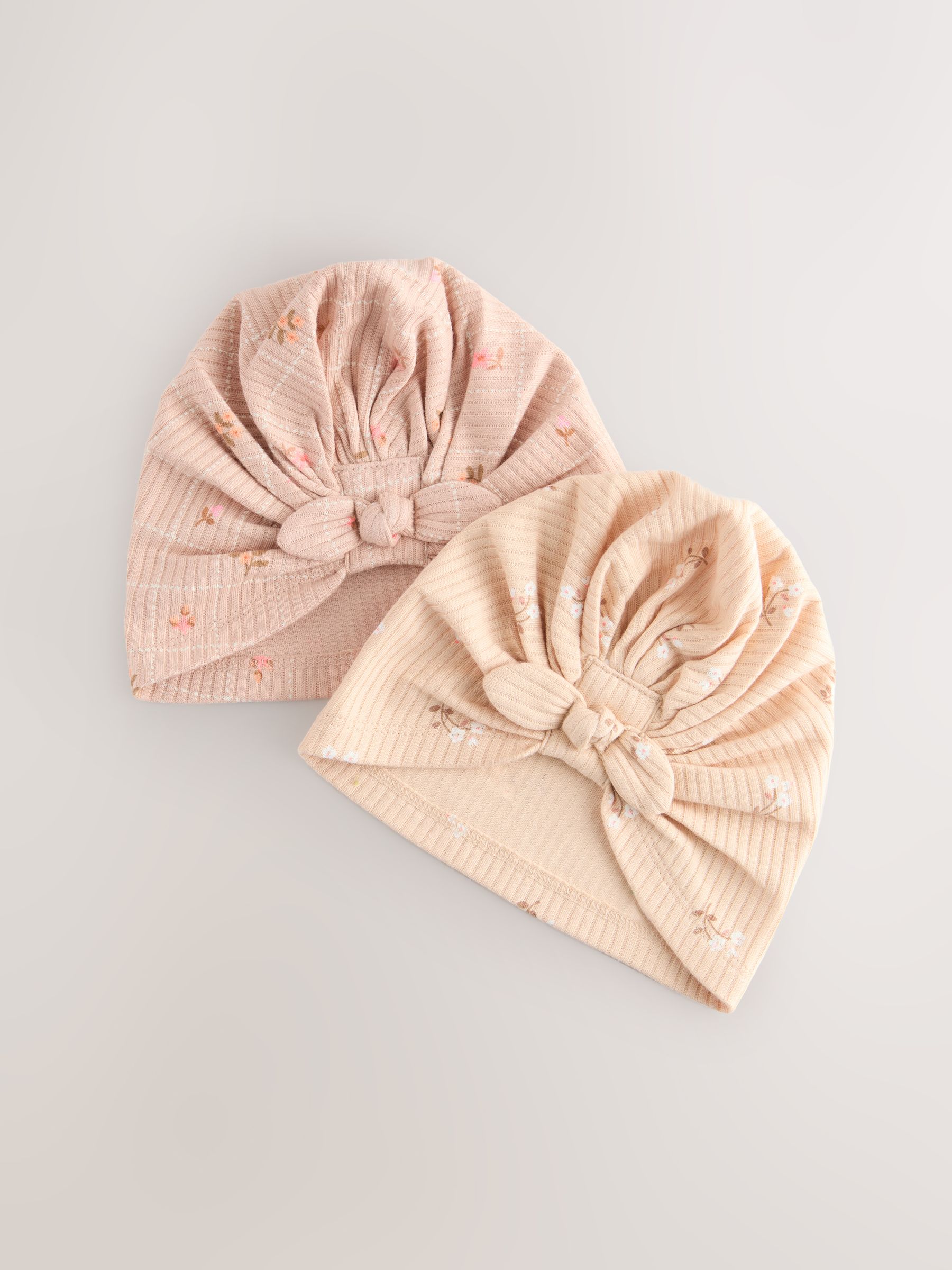 Abrikooskleur met fijne print - Set van 2 babyturbanen (0-18mnd)