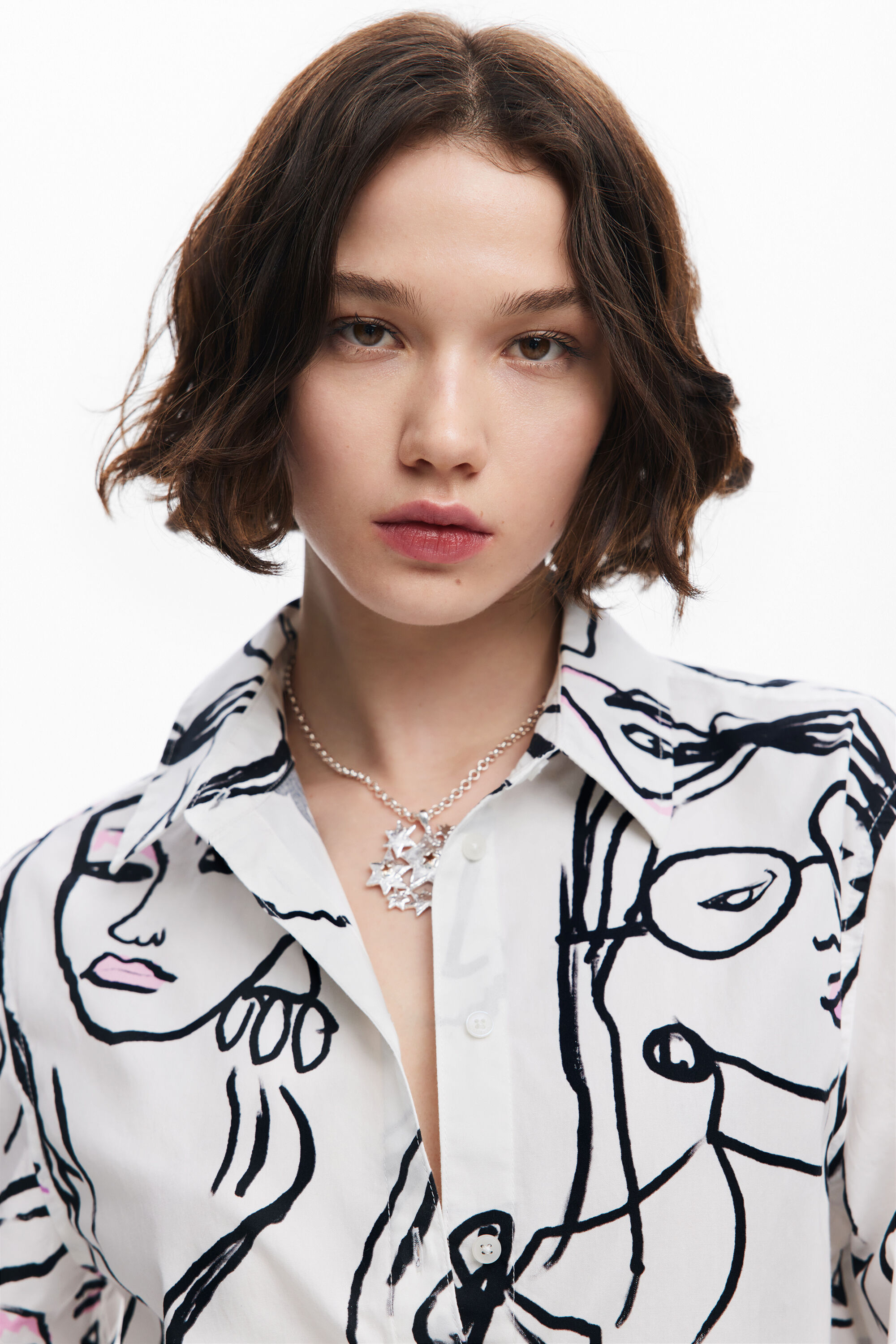 Camisa estampado caras