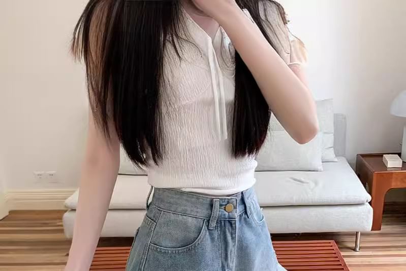 Kloitrinm - Hoge taille denim shorts met strik en kant