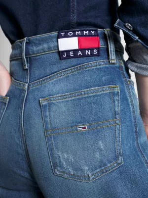 Calça jeans Claire de cintura alta, pernas largas e efeito desbotado.